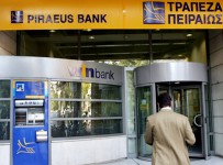 Греческий Piraeus Bank простит заемщикам долги до 20 тыс. евро