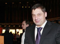 Акционер Бинбанка Шишханов займется санацией Рост банка