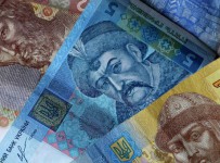 Нацбанк Украины видит риски для прогноза кабмина по курсу гривны